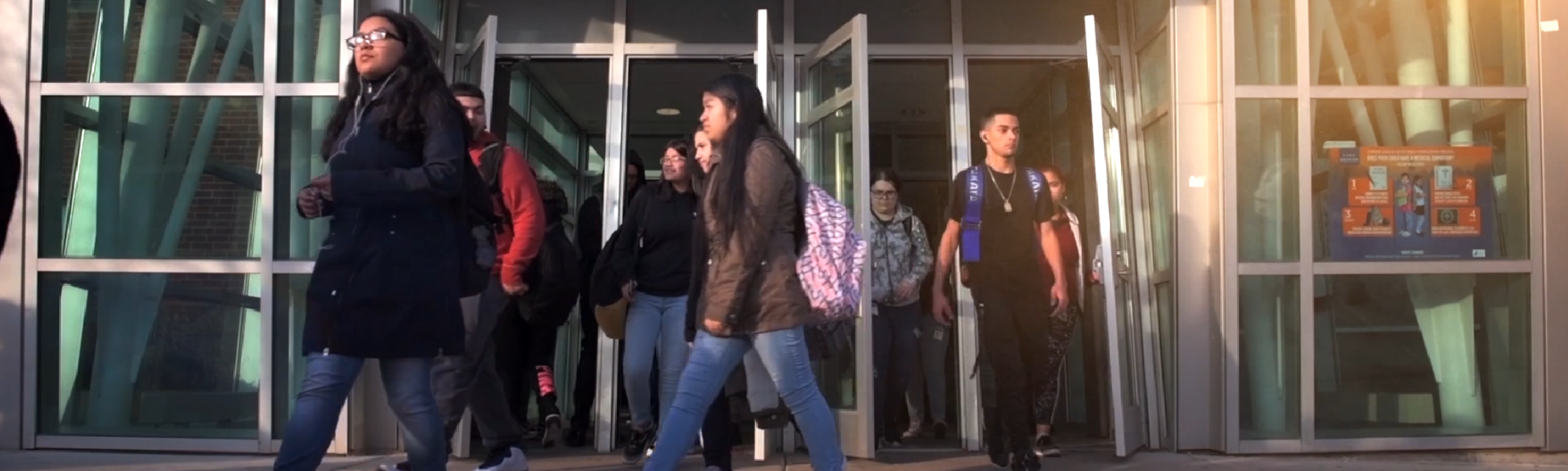 Freshmen walk out of their high school building